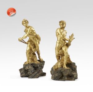 Due figure romane in legno scolpito e dorato